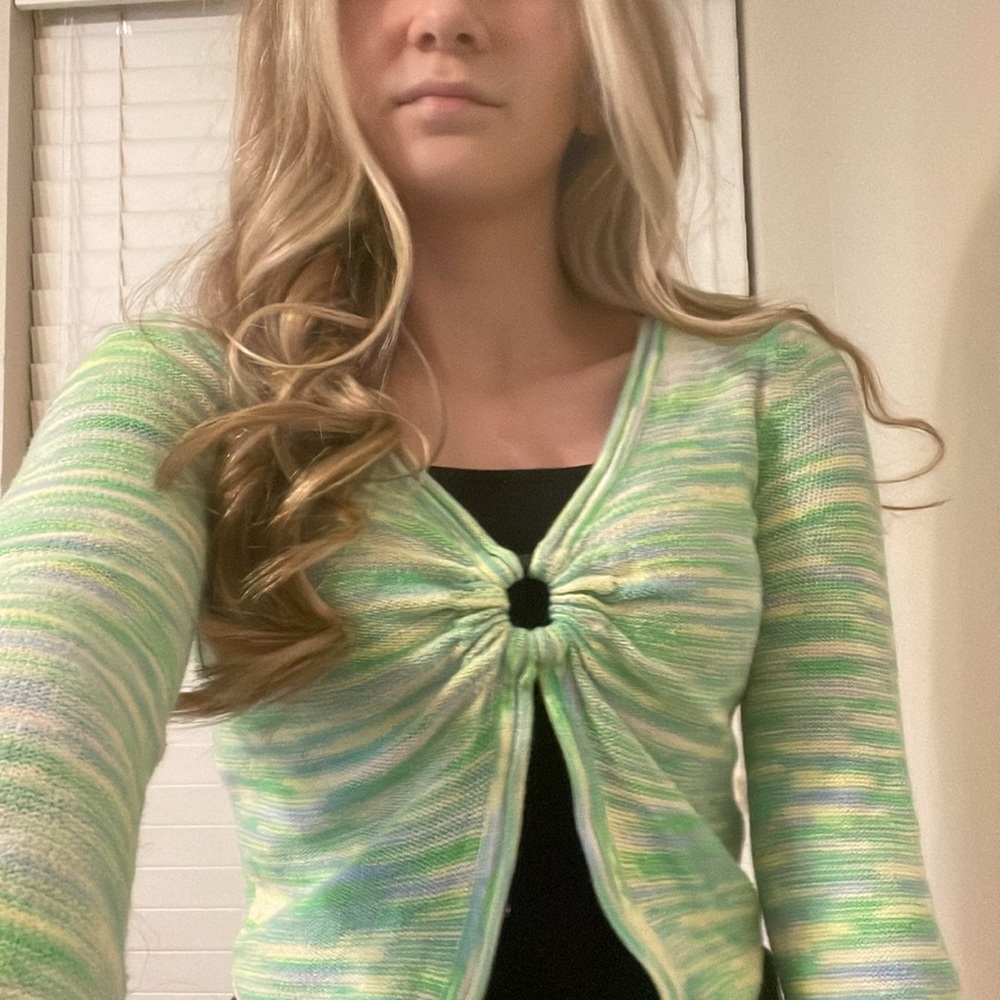 A jacket/cover up and a cami both never worn no stains can be sold separate